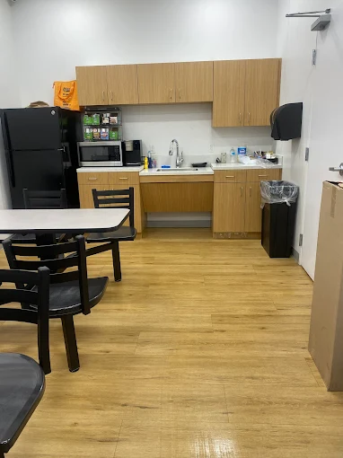 Spotless office break room cleaned by Shine By Lucy